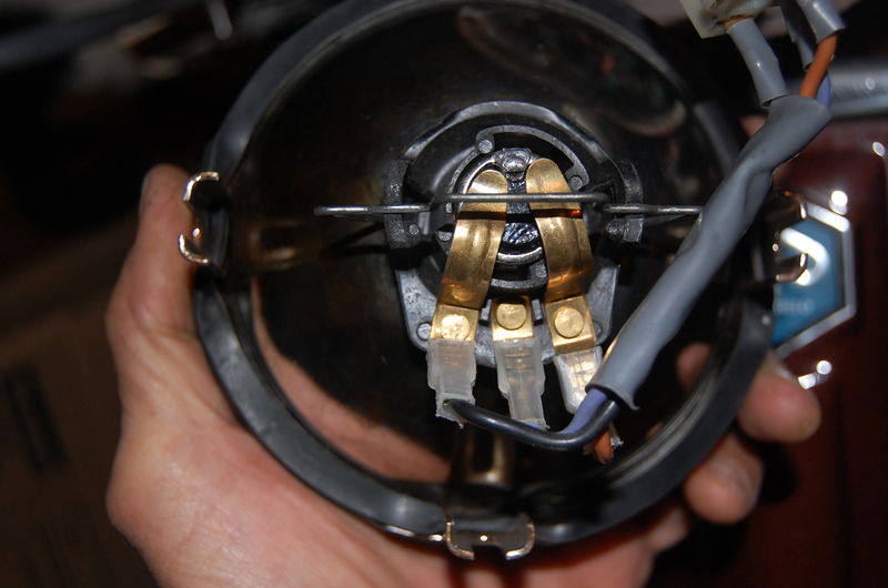 New headlight assembly to replace old.