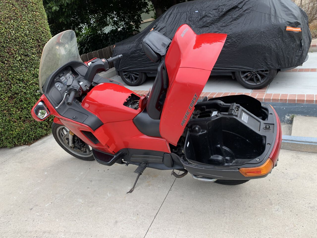 Motorcycle with a massive trunk