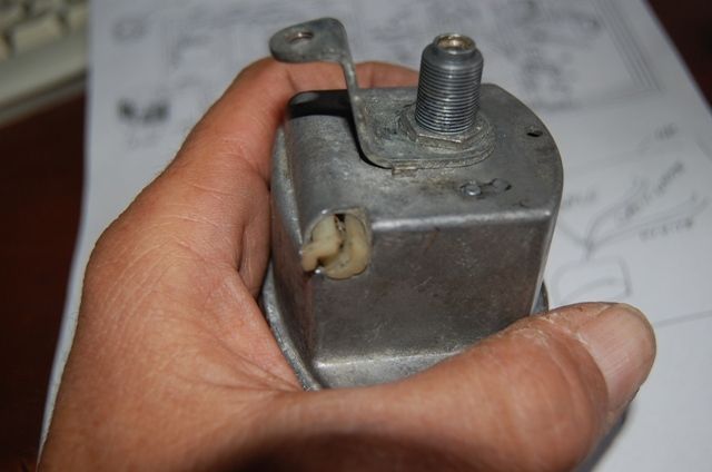 This explains why the speedo light wasn't working ... someone yanked the wire out.  Understandable - it took us a while to figure out how to remove the bulb:  Push in and twist.