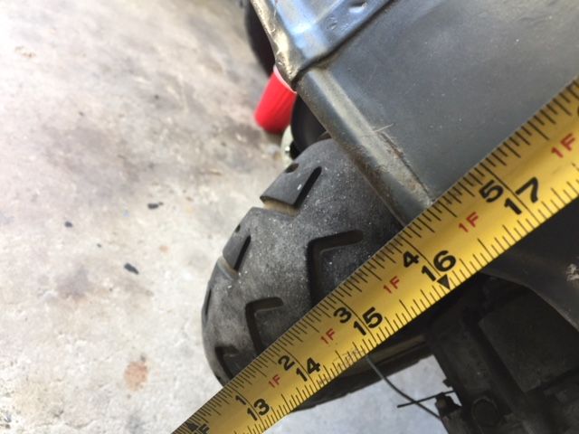 Rear of scoot full 16" off ground makes for ez tire removal