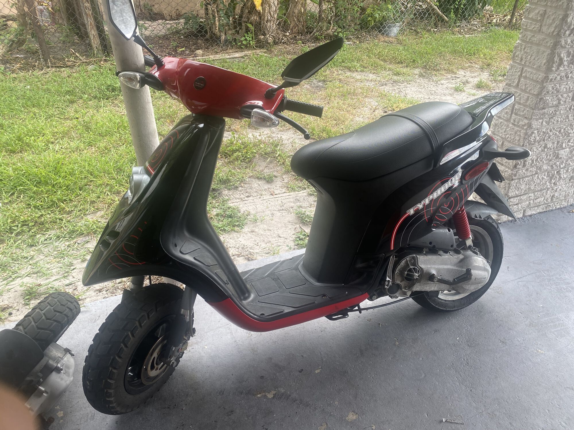 And there we have it folks, bone stock, even has the tiny 17mm carb from the 50cc. Runs smooth like butter.