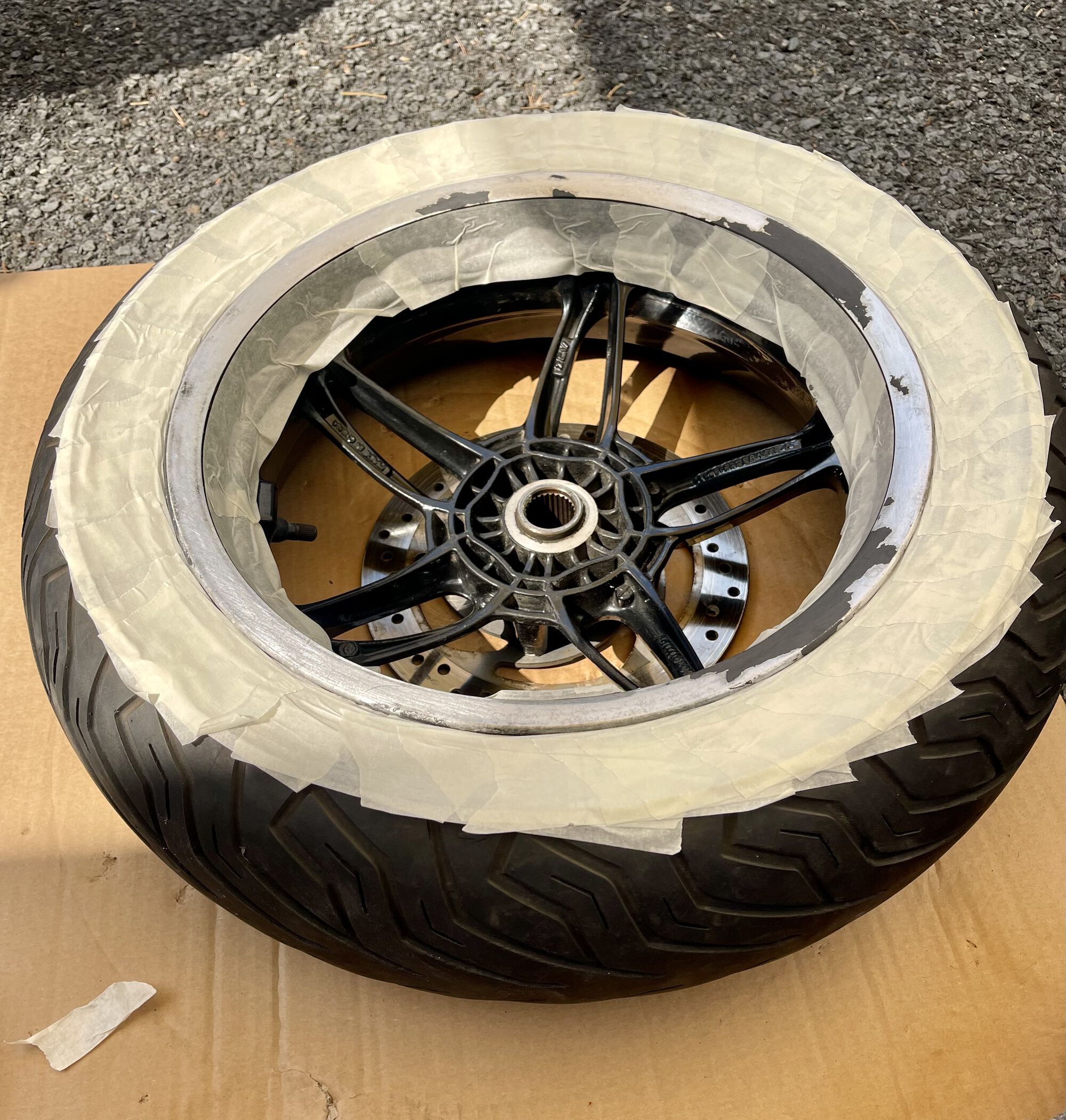 Wheel masked and ready for painting.