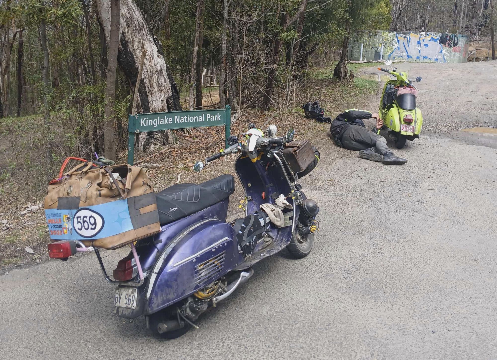 A RARE photo indeed... Me watching Il Ginchi Repair his scooter!