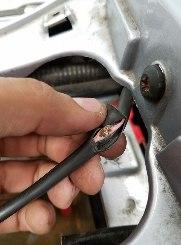 Close up of the wires that were rubbing against the frame.  These have been repaired now.