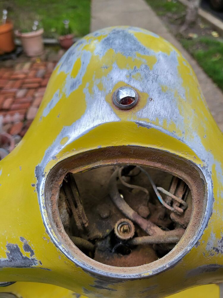whats that little nipple light for?!  It looks like a bolt, but its got an opening with a small lens on the back side of the bolt.