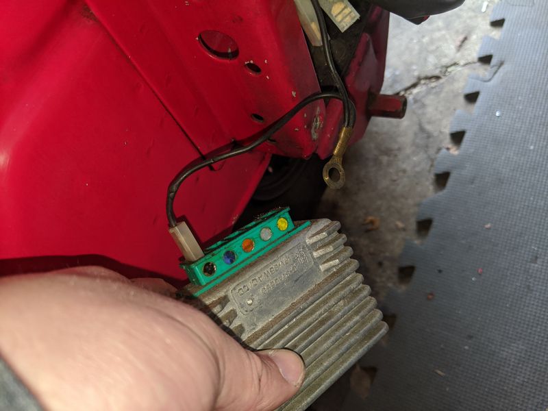 ac removed. this black wire is connected to the vape magneto black wire at junction box.  I will cut off the ring connector to connect rectifier spade terminal to ground leaving black from magneto to connect to rectifier without ground inline currently.