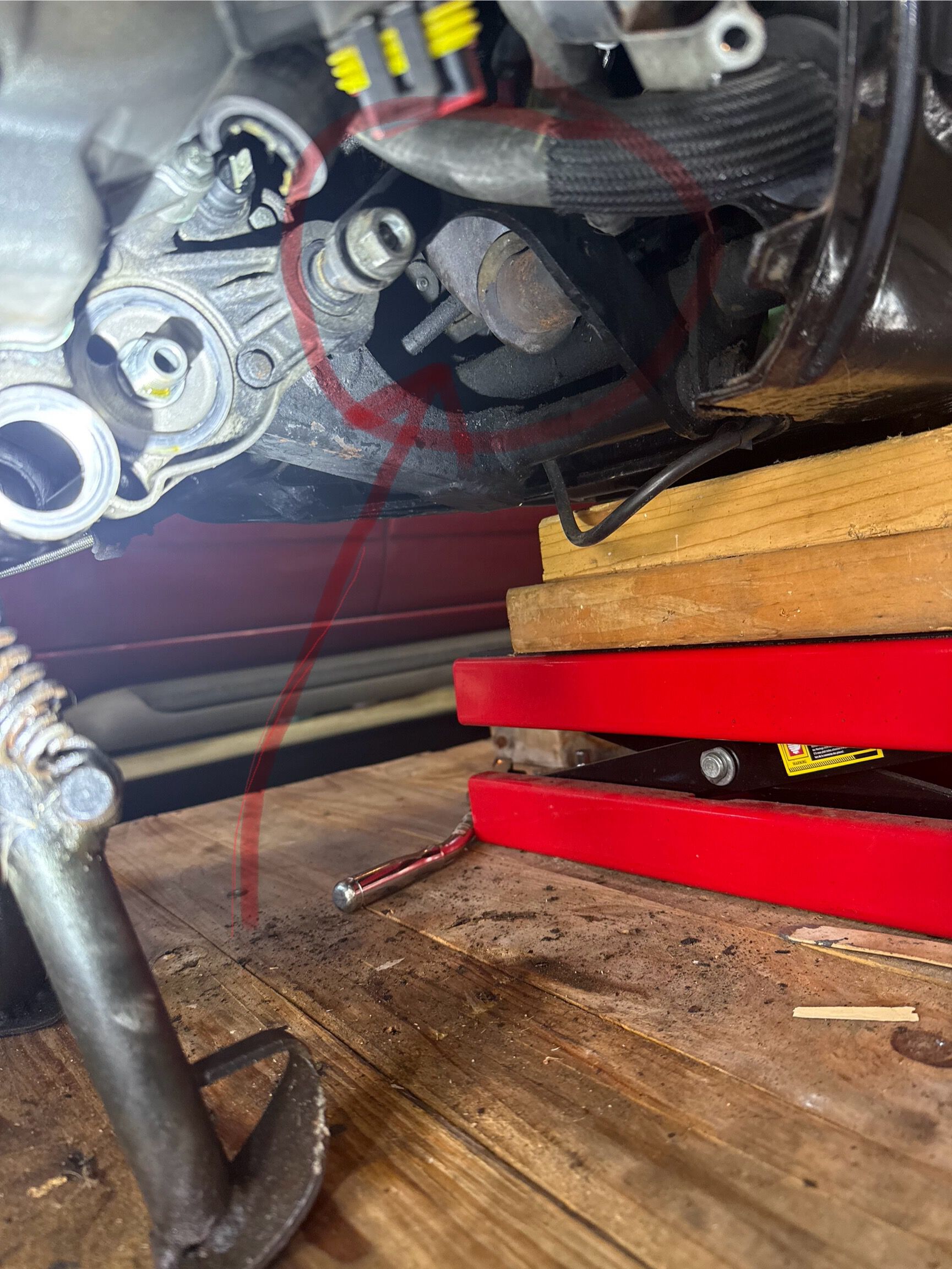 Underside of GTS, frame concealing exhaust lead pipe