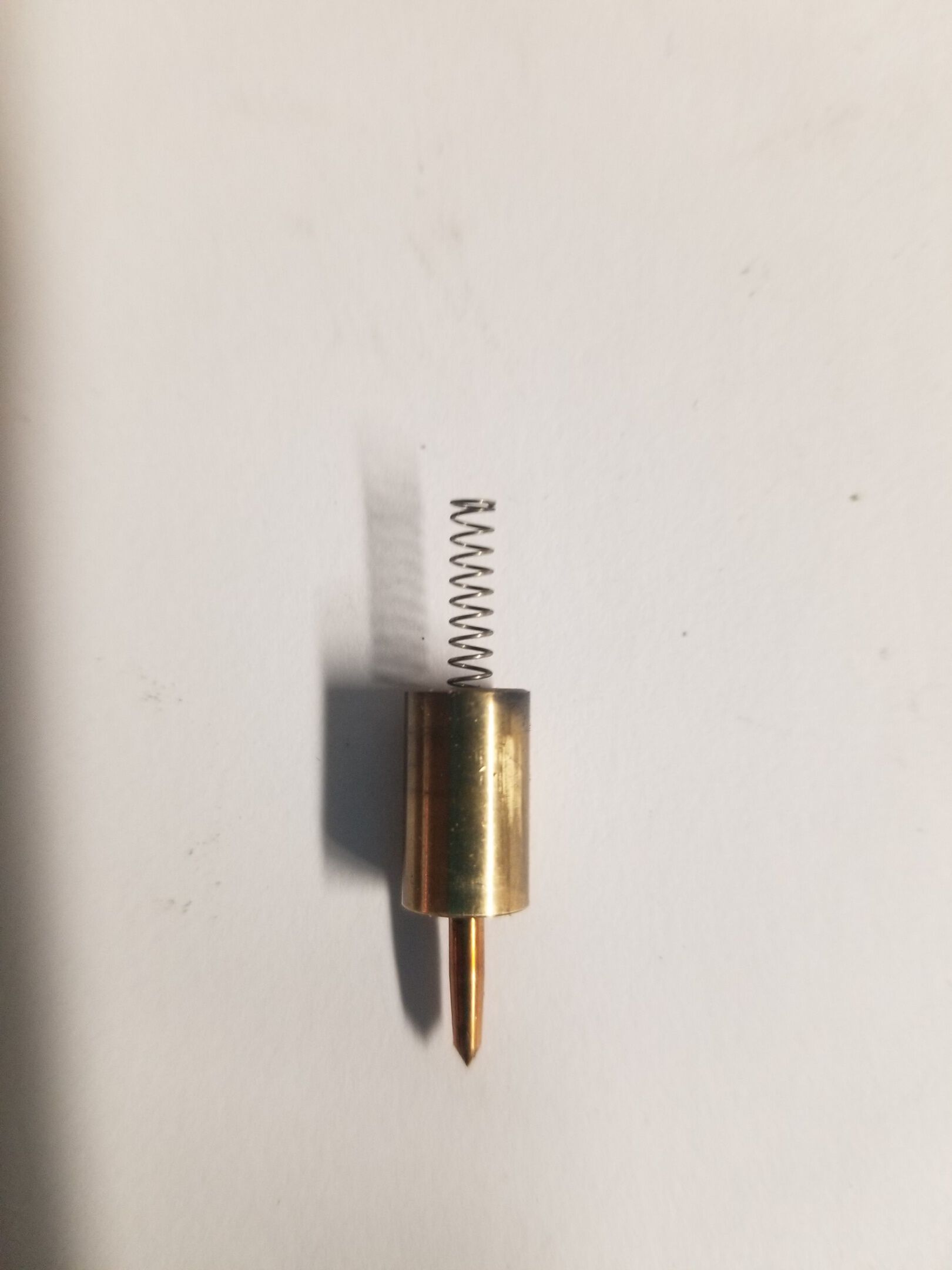 Needle removed from choke assembly. When the choke is installed without this, it starts and runs well. It's just like having my finger covering the hole.