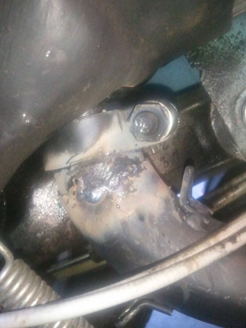 bolted into the bike and tack welded in place w/ about a quarter inch lap inside