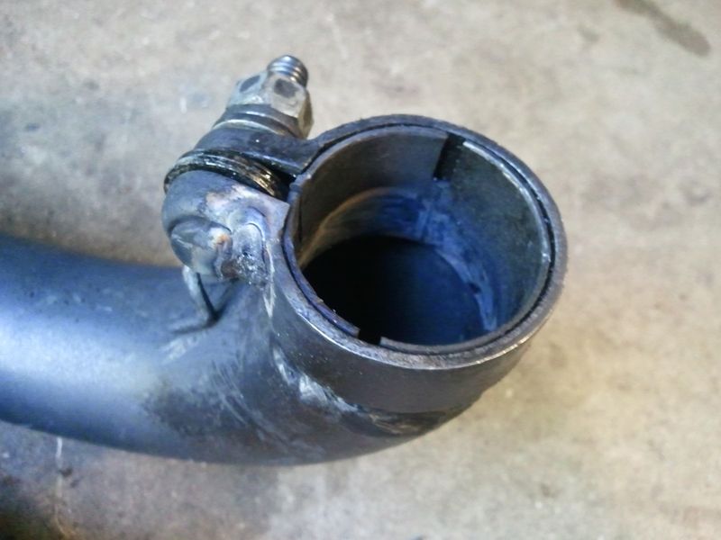 ground smooth, all painted and looks good inside - job done
the washers in the clamp gap prevent the tip collapsing & force it to clamp tight