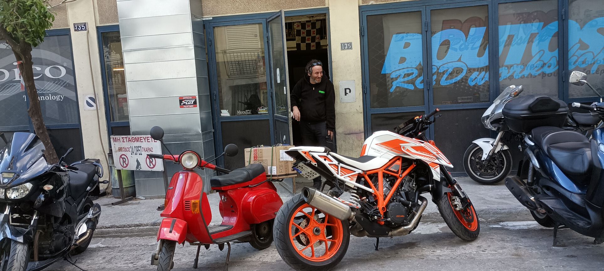 So I took my favorite PK out of the house this morning to get some gas AND to visit Kostas and test out the new rack picking up the bargain deal he'd just received. That is he telling me to drive carefully & don't dump the package.