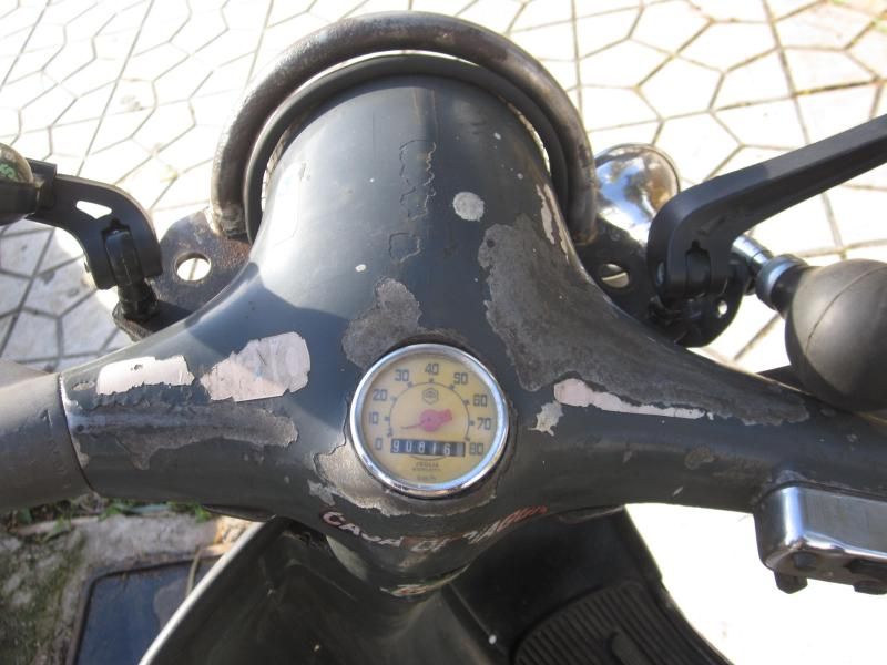 I glued a piece of black rubber edge molding around the rim