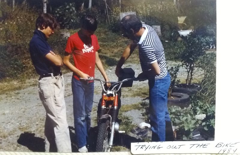 That's my son KC in the red shirt, who now has the family Rally 200 and takes his lil girl Lucy riding with him(with her helmet on of course!)