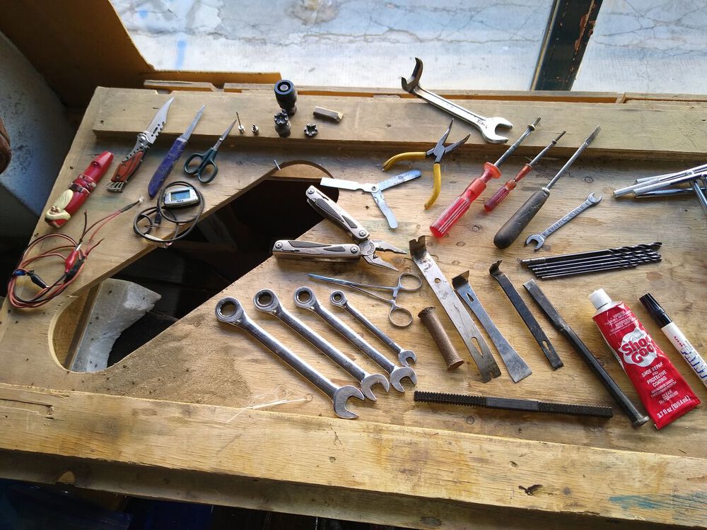 Anyway, these are my favorites that always come and go with me, can you guess what they all are?

Except for that wicked switchblade knife which I just purchased at the street market and is going home with me, heh heh...