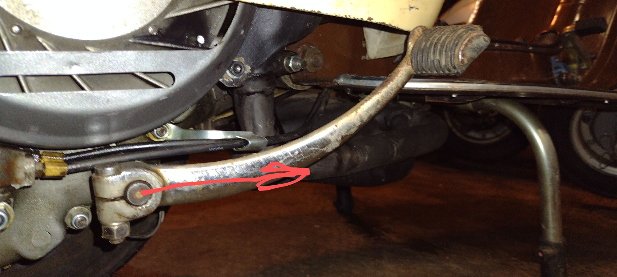 The original curved lever, that line thru the spine pattern is nearly parallel to the floor