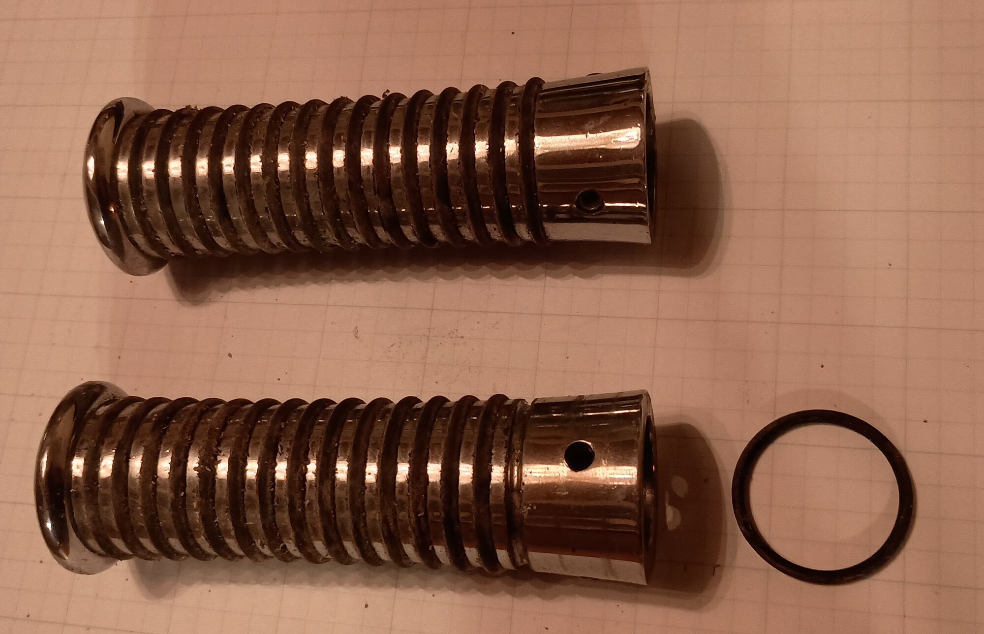 These are mine, turned aluminum w/ grooves for 15 O-rings which 1 or 2 would often roll out of the groove while you're going down the road.