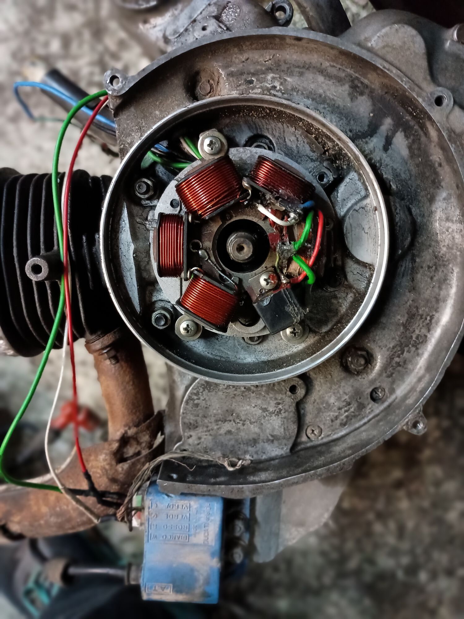 The red, white & green go to your CDI for spark Coming out the other side is the blue for power to lites etc, ground is black and green kill wire when you shut it down.