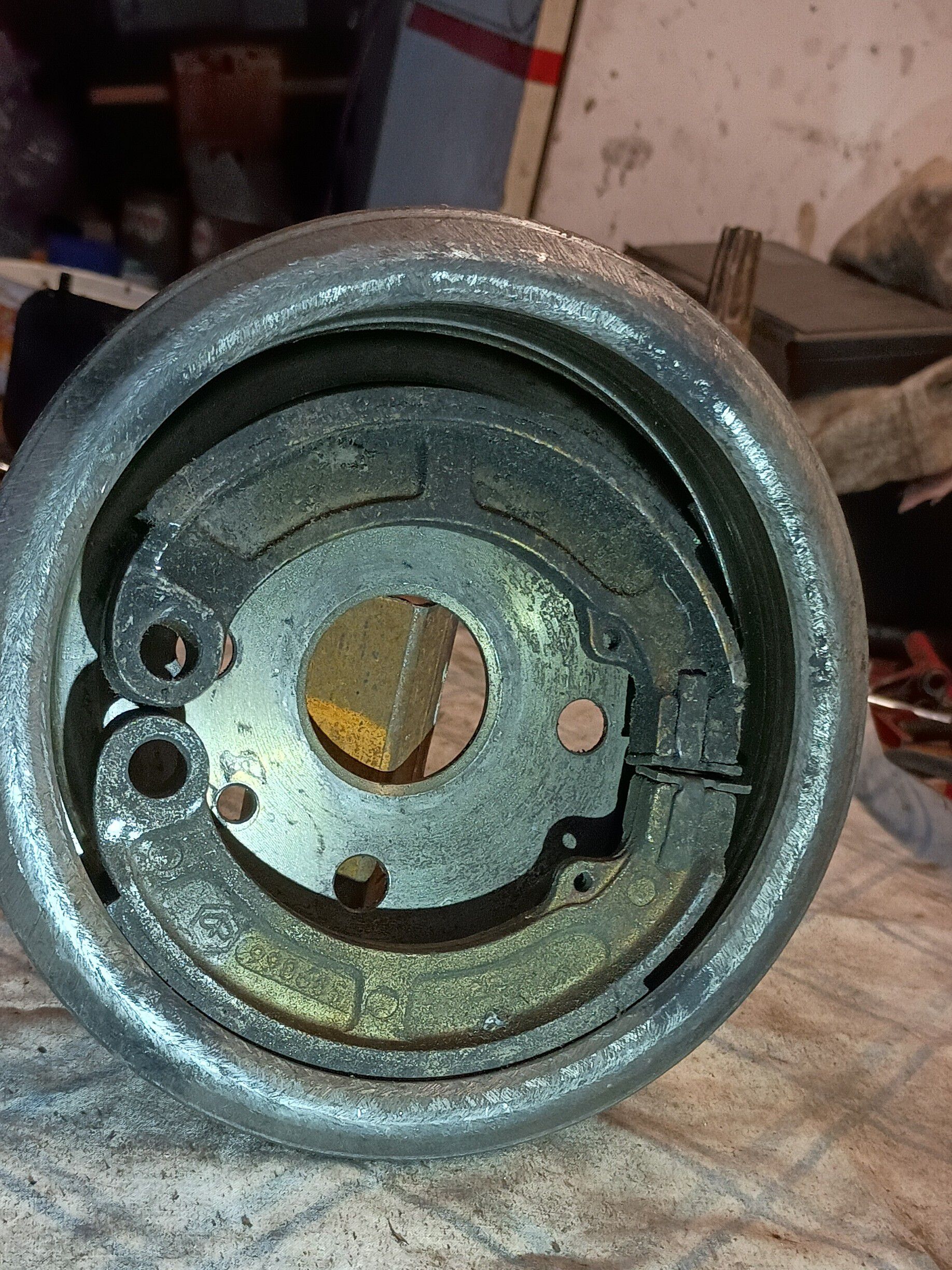 These are old shoes for this brake drum that pivot on on separate posts.