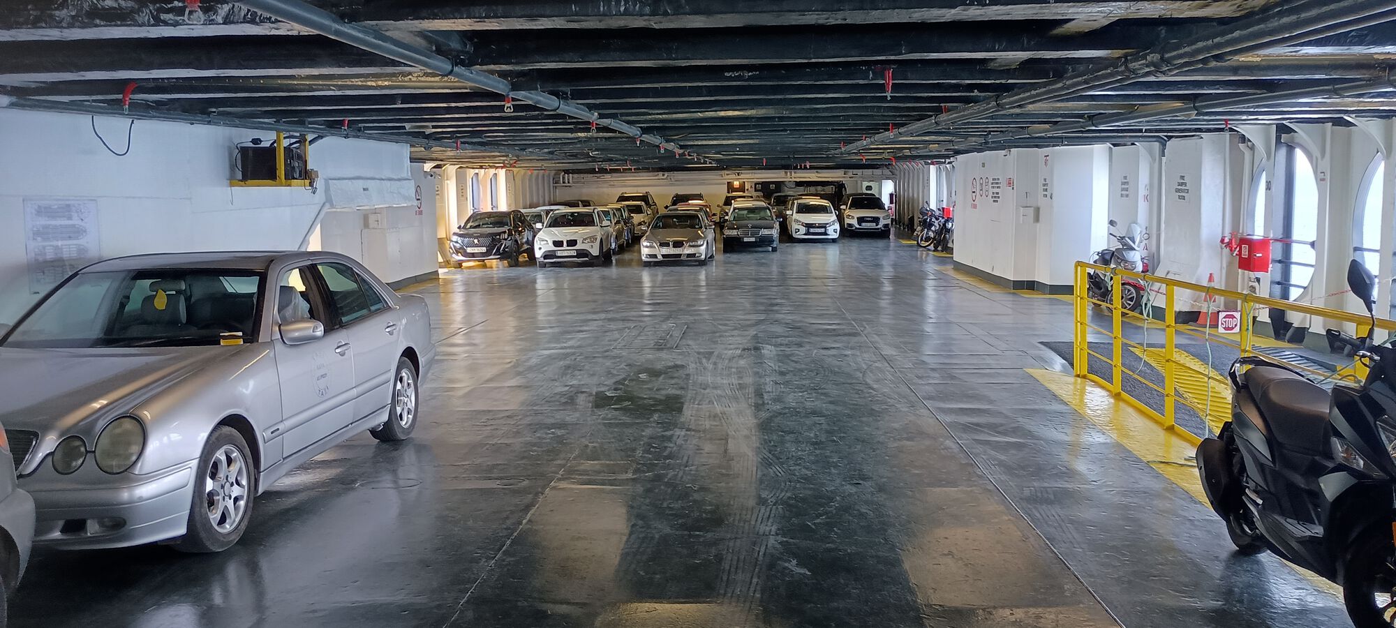 Ferry was maybe 10% full. This is the upper car deck, trucks, buses and a lot more cars fit below on main vehicle deck but mostly just some trucks and a few buses this run.
