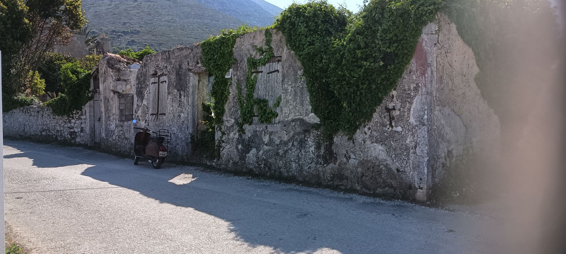 Looking back up the road you can see a bit of the mansion