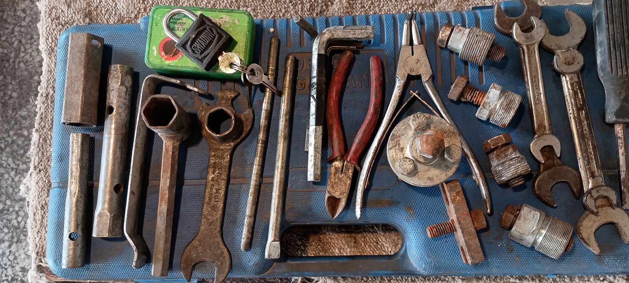 What was all that rattling when flipped over? We finally open tool box and see that Dad had a fair collection of tools.