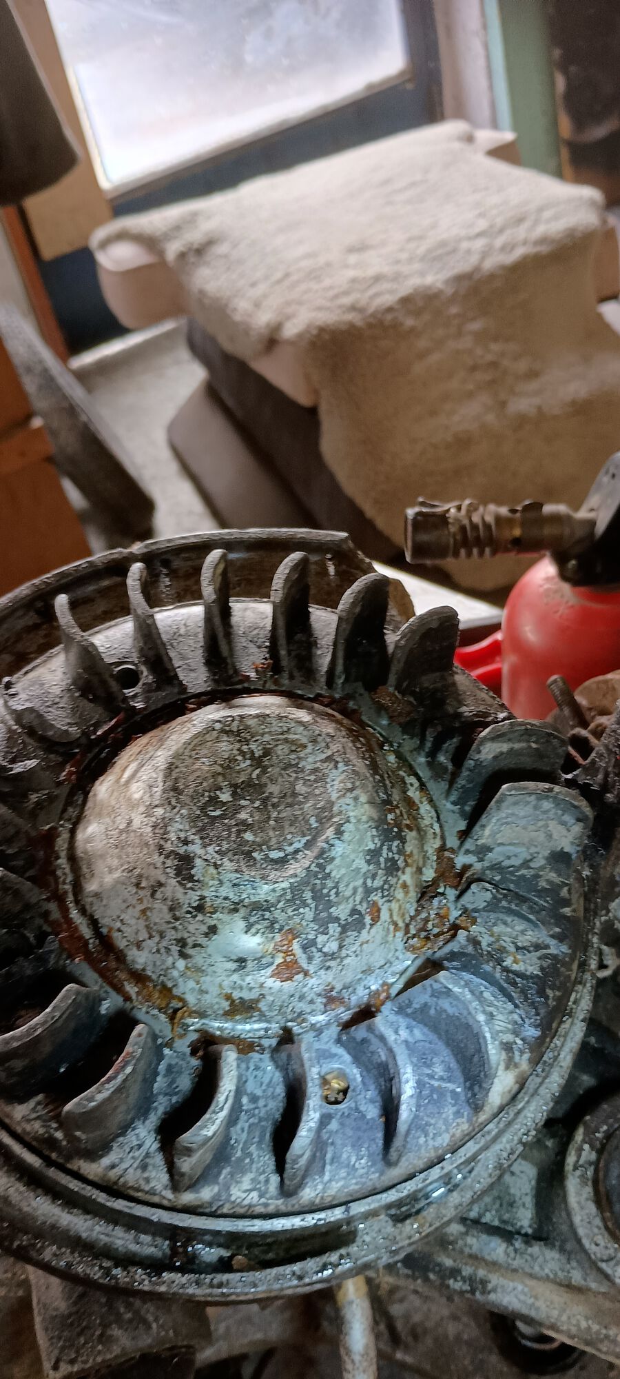 Allen screws out and nothing budges. I've started scraping out the red glue and may try some heat