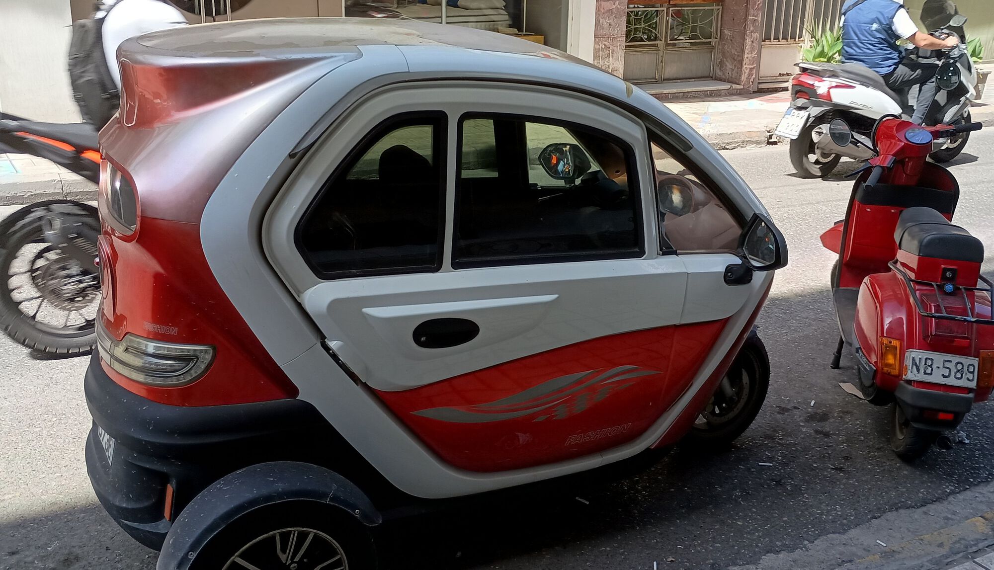 Quite the modern electric tricycle bubble car!