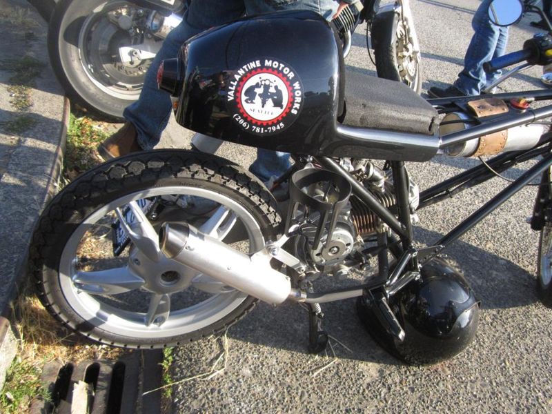 Some of us scooter ppl were looking at this, wondering what it was made from
we got quite excited when we spotted a Piaggio mark cast on the motor
what is this thing, anybody?