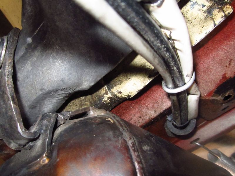 had to bend muff mounting tab, grind swingarm & mash over the body flange here