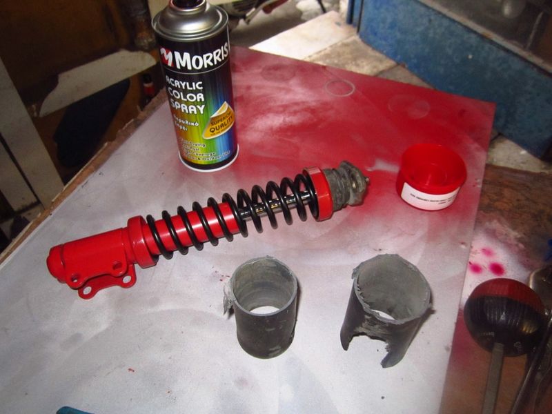 I cut the ends off the sleeves to seat the spring & painted to match the rear shock