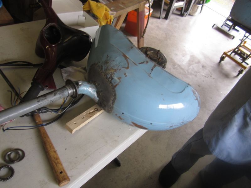 at least my mudguard beats this poor mess
this side was badly cracked so he bonded a doubler on the back side
new mounting area is spot welded all around for strength
except for 90% decent paint, this was near dead before Doc operated on it