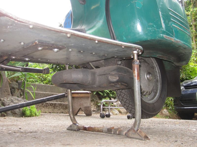 Nice! It straddles the muff.
I welded nuts for 1/2" bolts to extend the legs & make them adjustable.