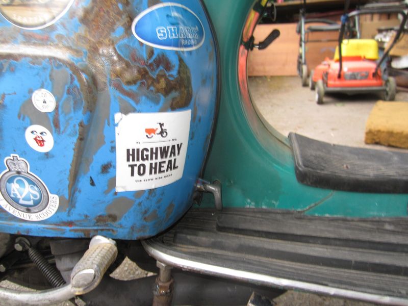 Not so nice. Even with the floor reinforced w/ 16ga galvanized sheet, it can bend the corners up. 
No way it'd work on a stock bike so I'll add the crossbar to spread the load