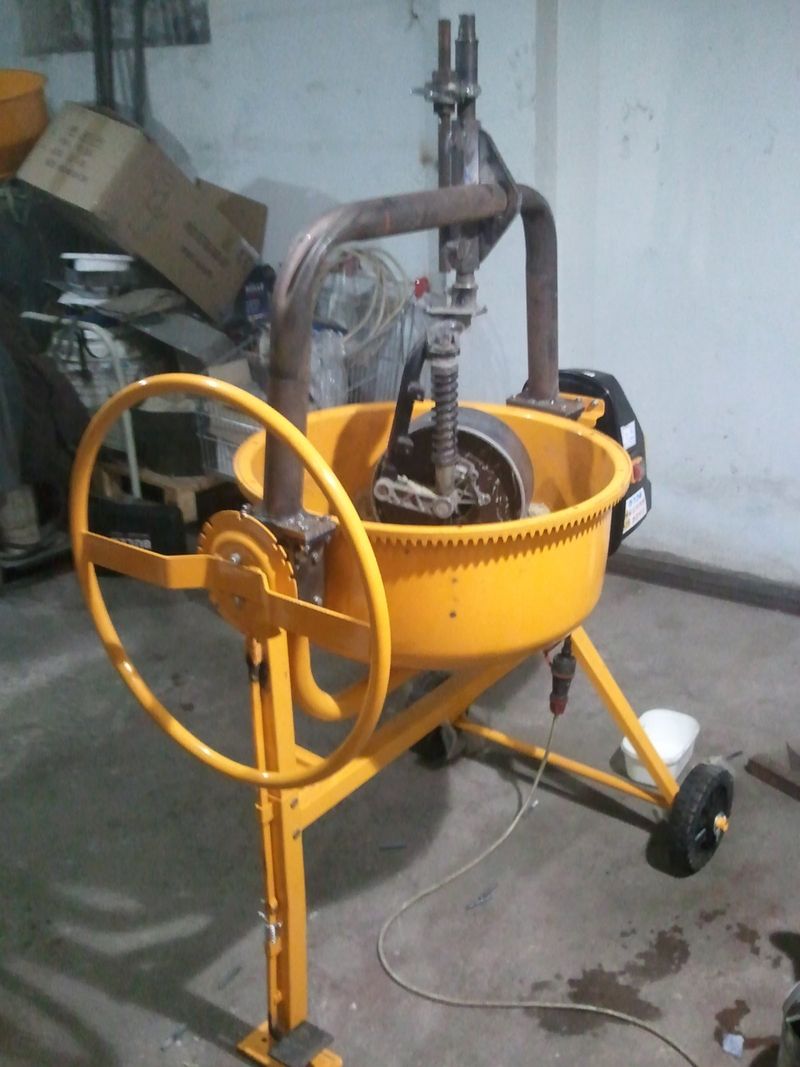 No disk brake forks were harmed here.       
It could be unbolted, removed and put in any P, no welding to the fork.
But it wouldn't fit in my luggage, boo hoo.