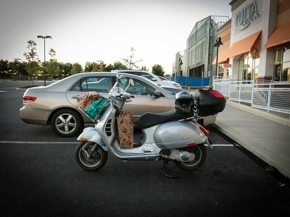 At Trader Joe's.  Topcase holds two bags of groceries.