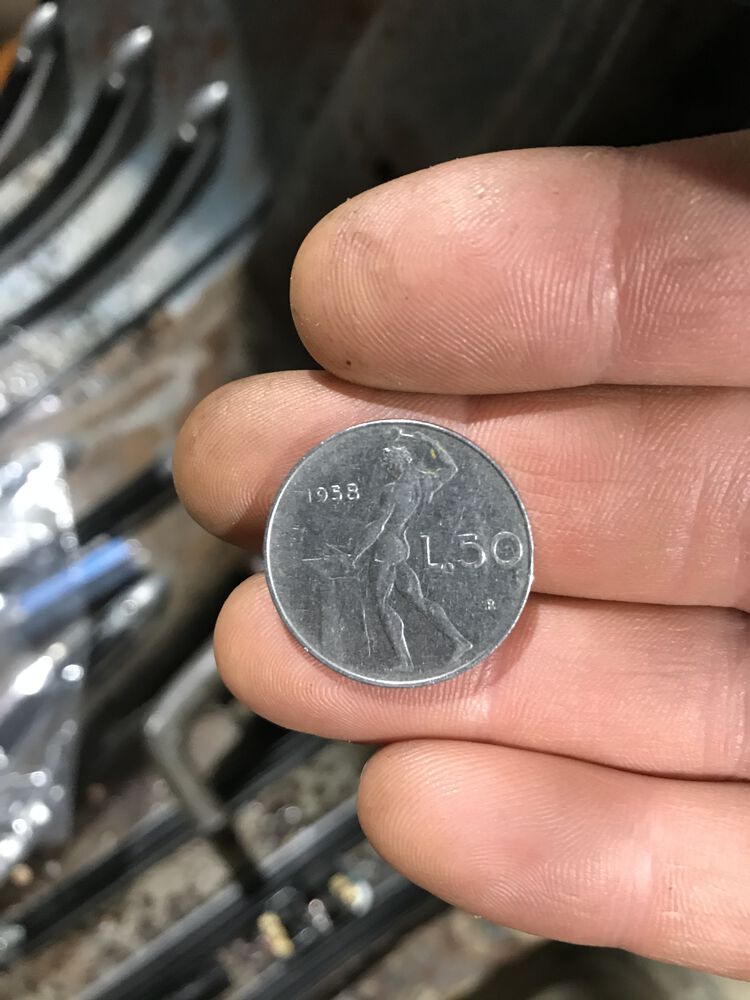 Vulcan god hammering on the backside...gotta watch out where them hot sparks are goin