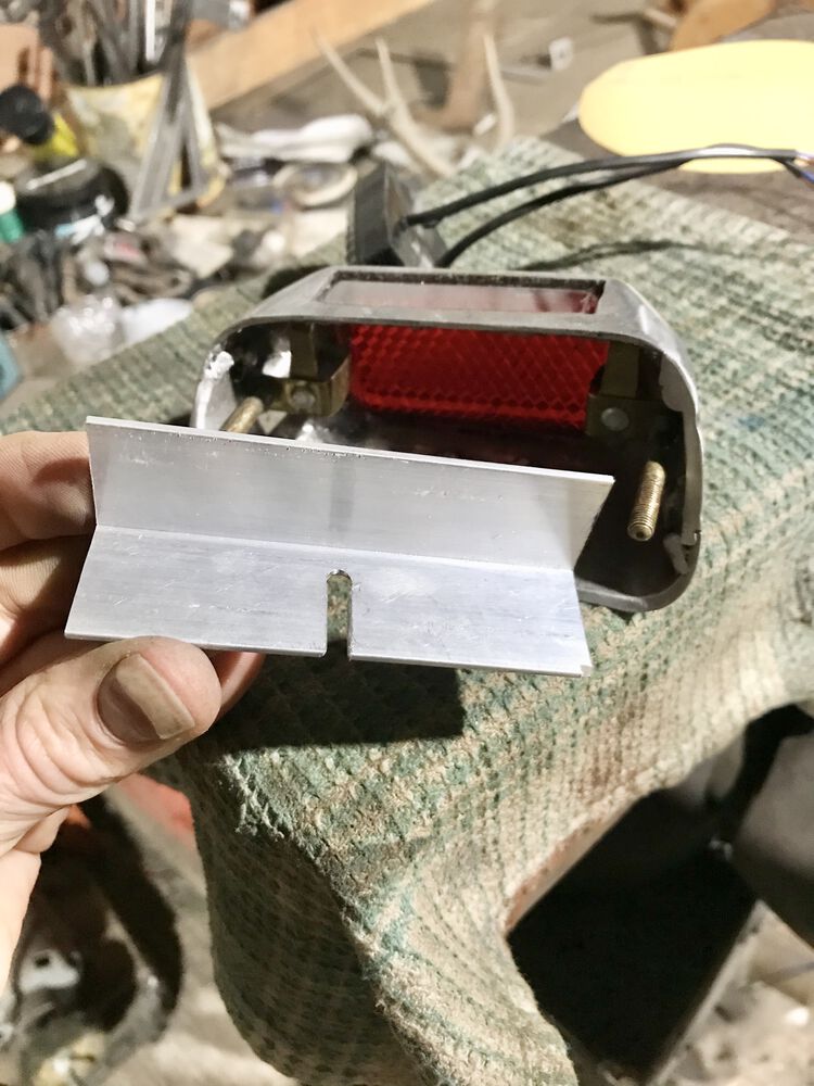 a little slice in the metal so that there's clearance for the wires