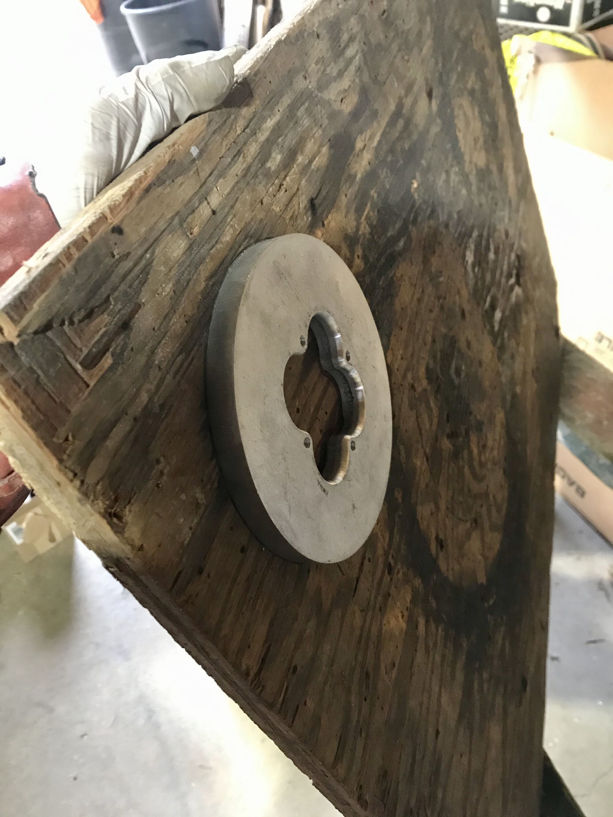 top side of work bench. This is right after i used a 3/16" round over bit to contour the clover leaf portion of the bezel.