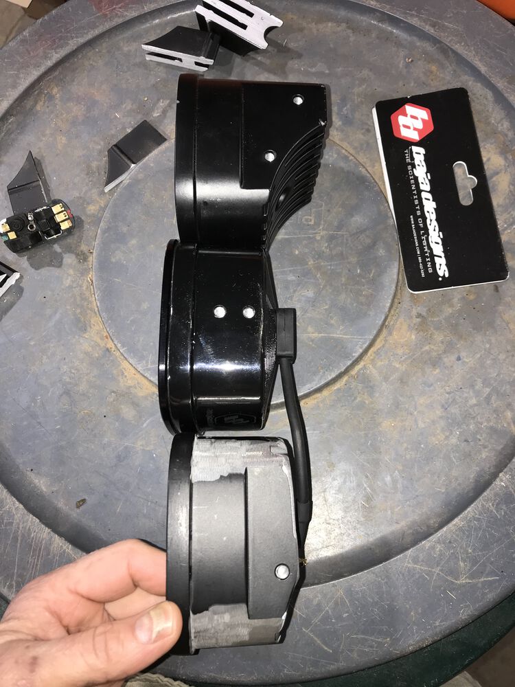 Side profile. Top LED is a standard housing. Middle LED is the special low profile housing. Bottom light is a standard housing that i cut down.