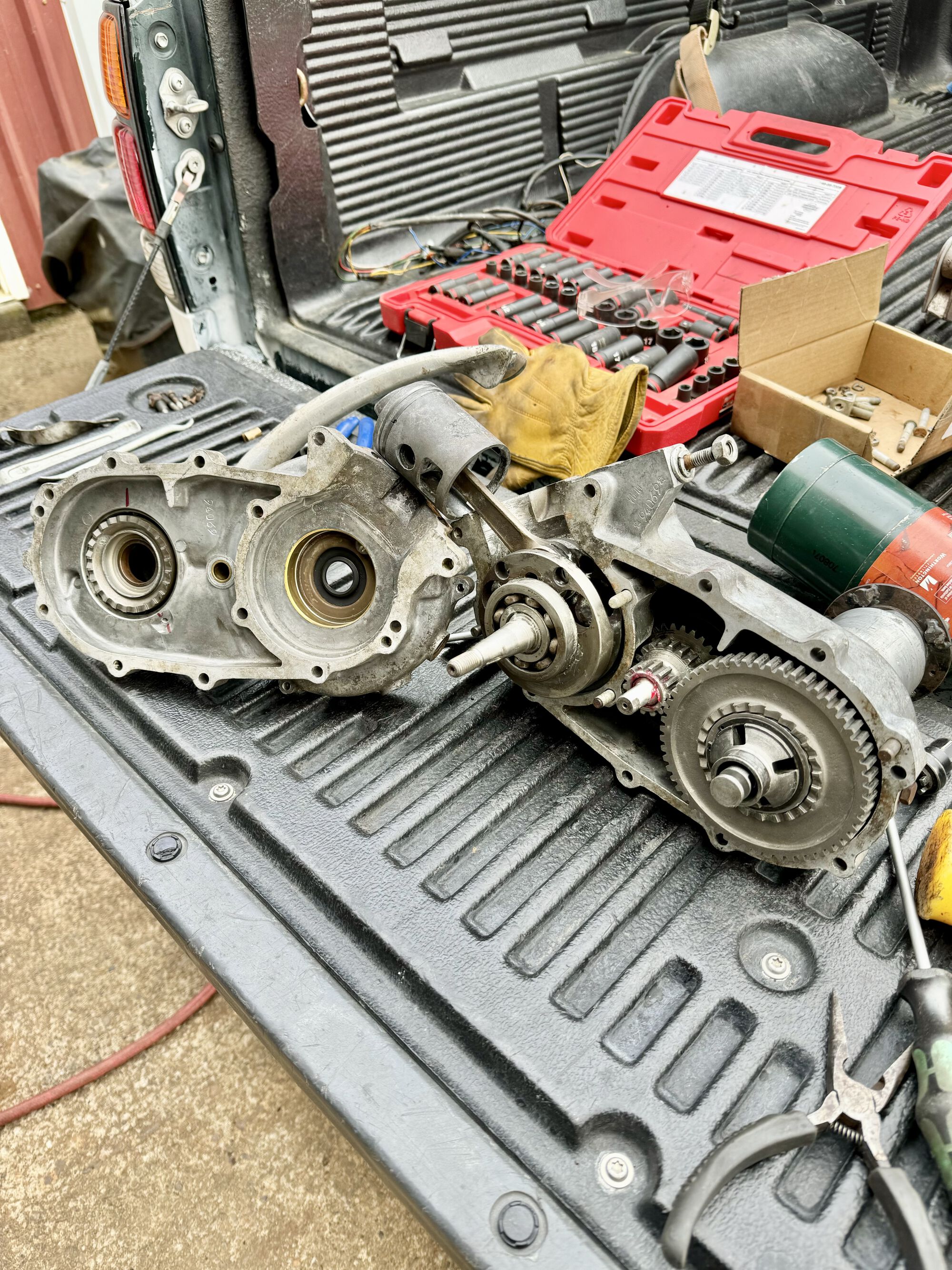 I cleaned up the entire engine (inside and out) and reassemble it. i sprayed down all the metal bits with chain wax before reassembling.