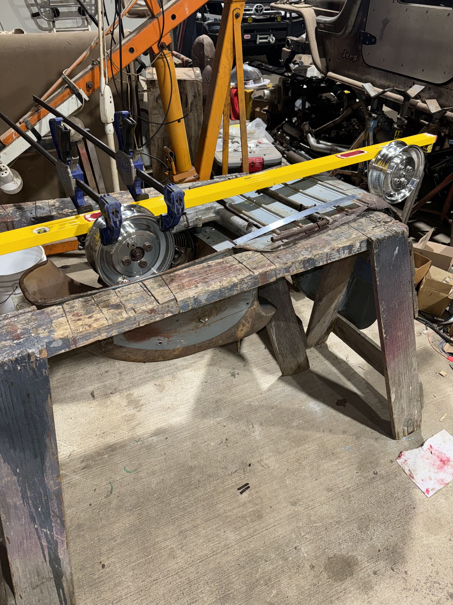 6.5' Stabila level, two heavy duty clamps, and SIP tubeless wheels are my go too for centering and lining up the engine and fork together.