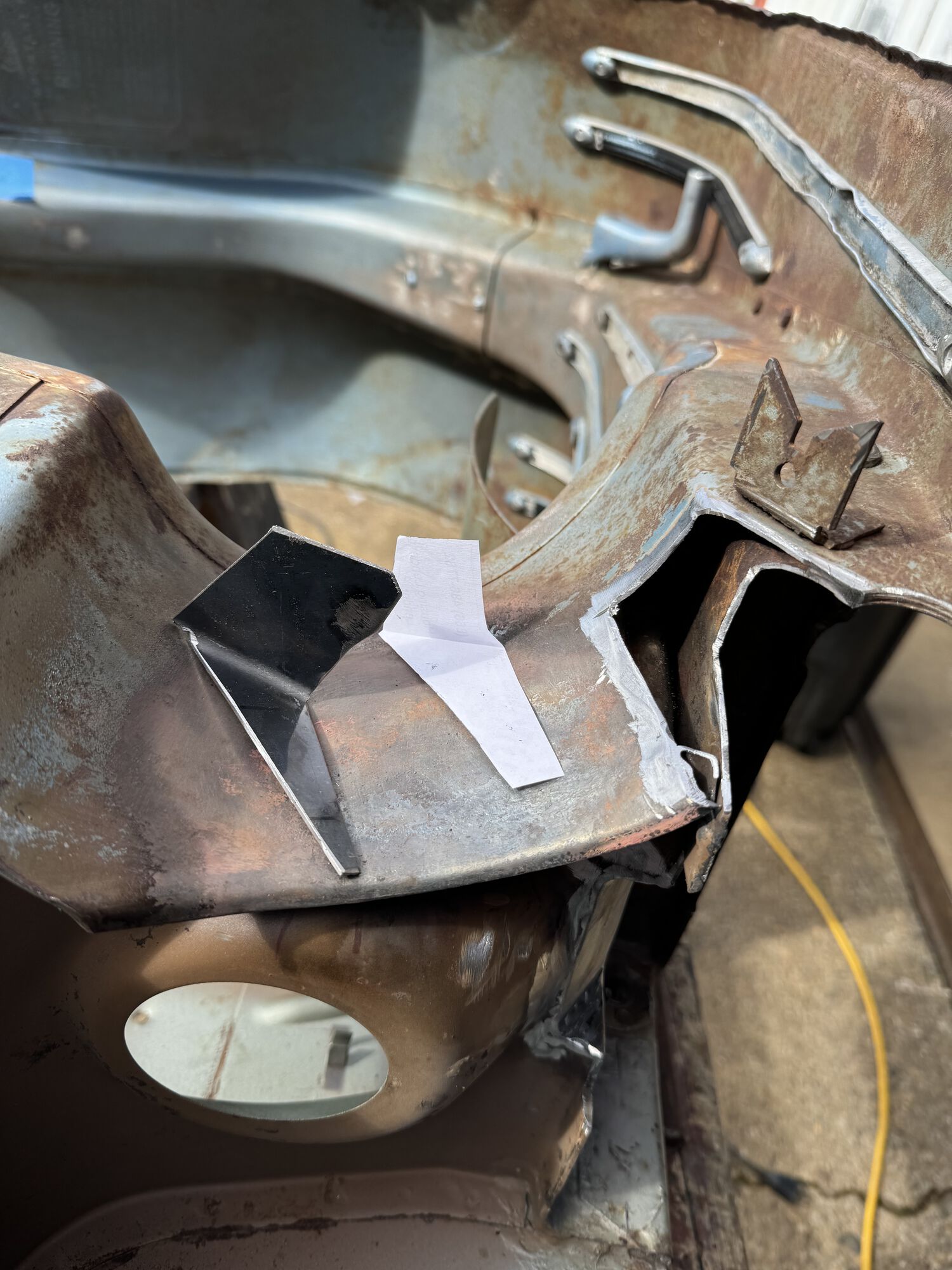 made a paper template to fold up a metal filler piece