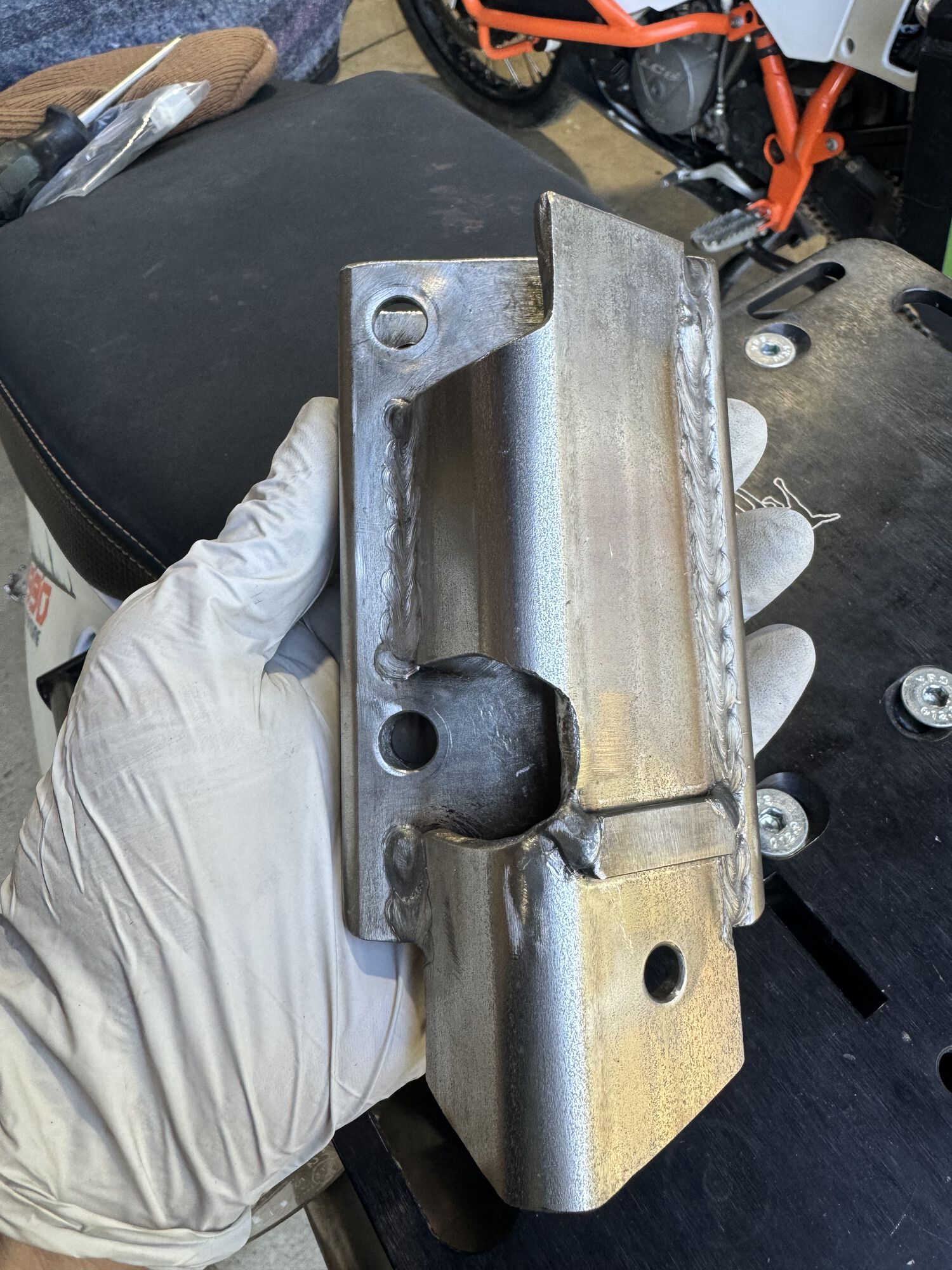 note the thin strip that's welded perpendicular. It located the P series rubber shock mount buffer.