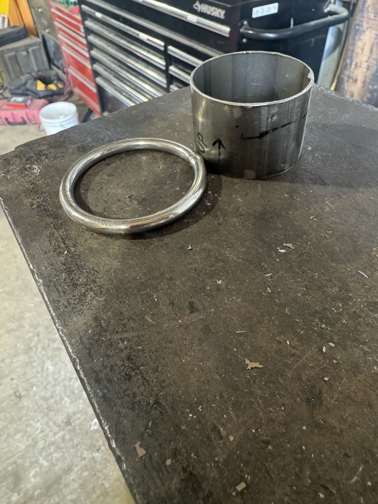 1/4" x 2" i.d stainless steel ring and a 2" o.d. stainless tube. Both happened to be 316 alloy.