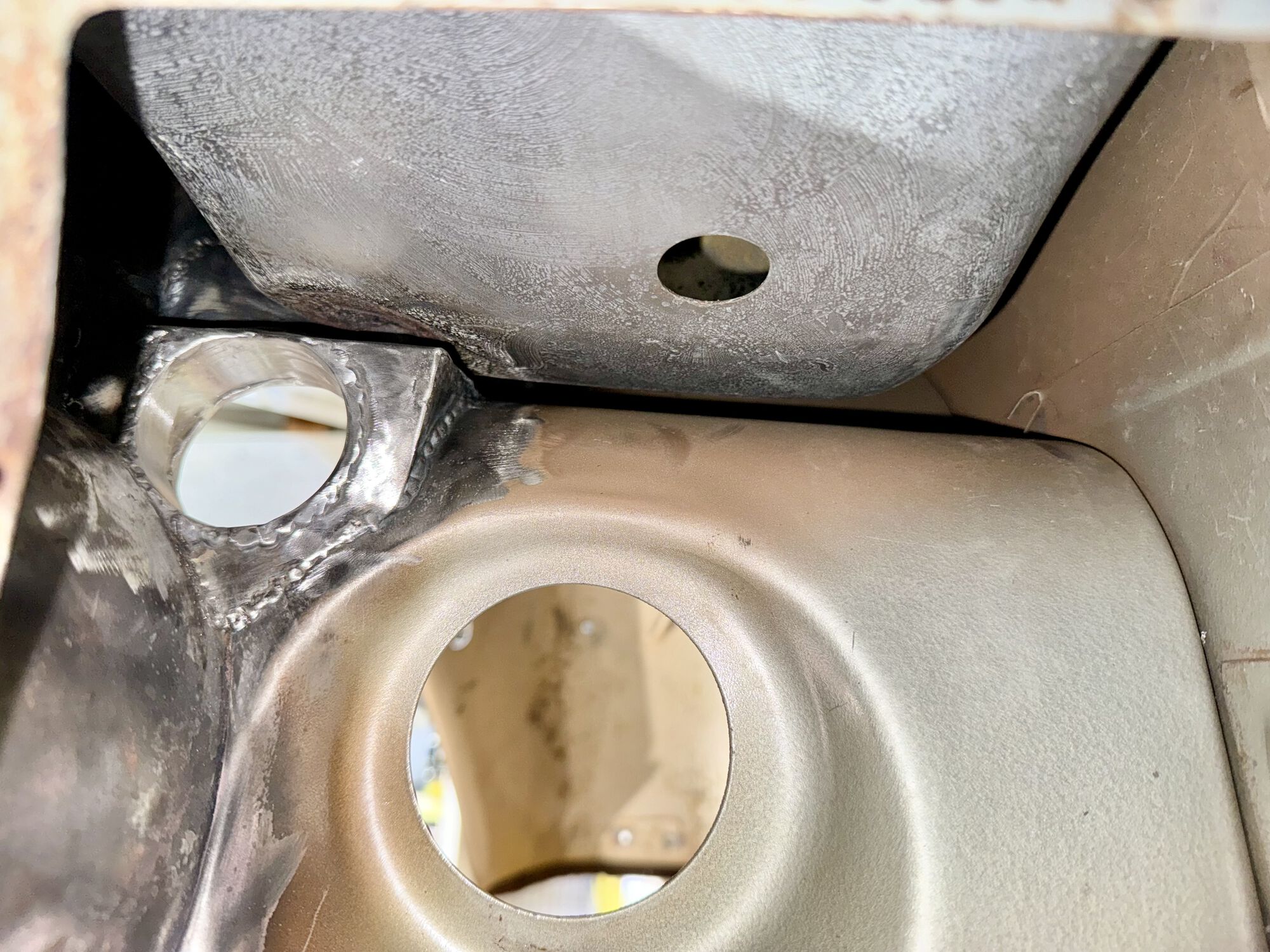 Here's a pic with the fuel tank installed. It's a tight fit for sure, but nothing is rubbing.