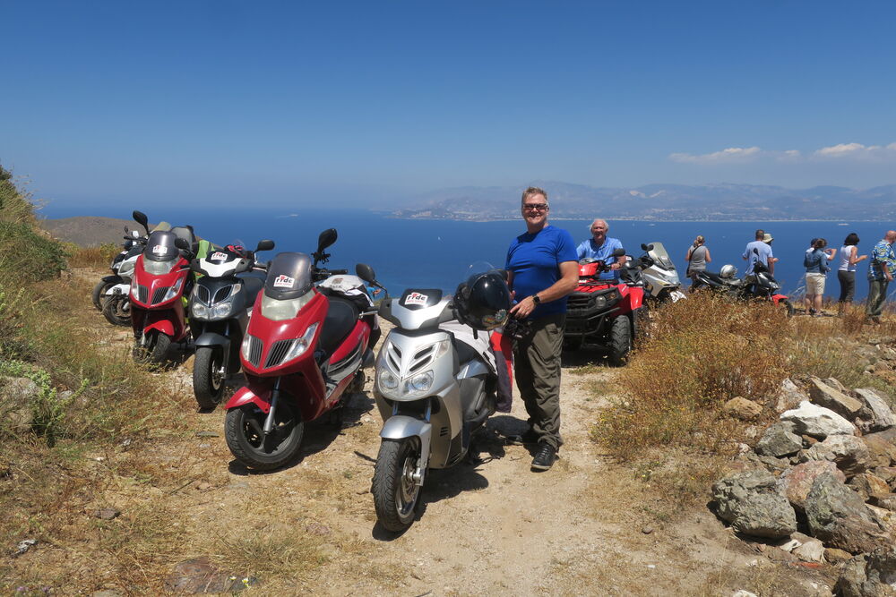 Warren where he was most comfortable, on a scooter adventure, this shot on top of a mountain on Paros.