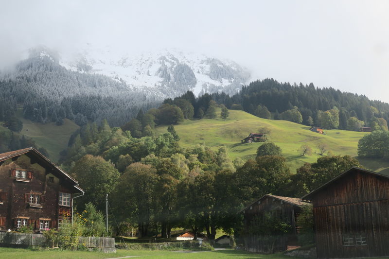 Old barns, pasture and Alpine mountains.  All in one shot.