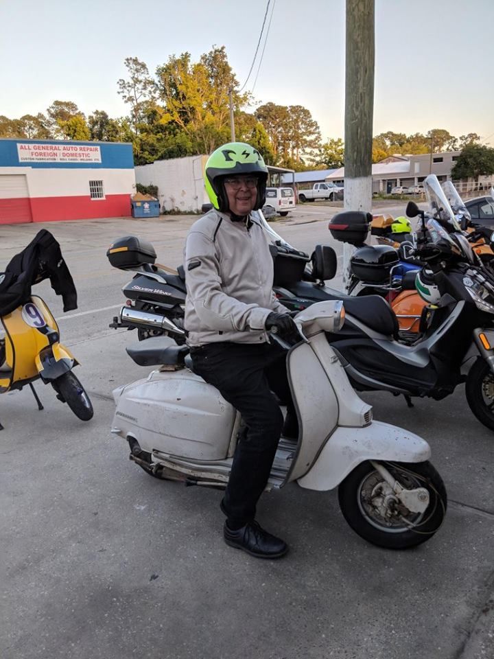 Dorky me on my 53 year old Lambretta Series 3 last night.  This is my old helmet.